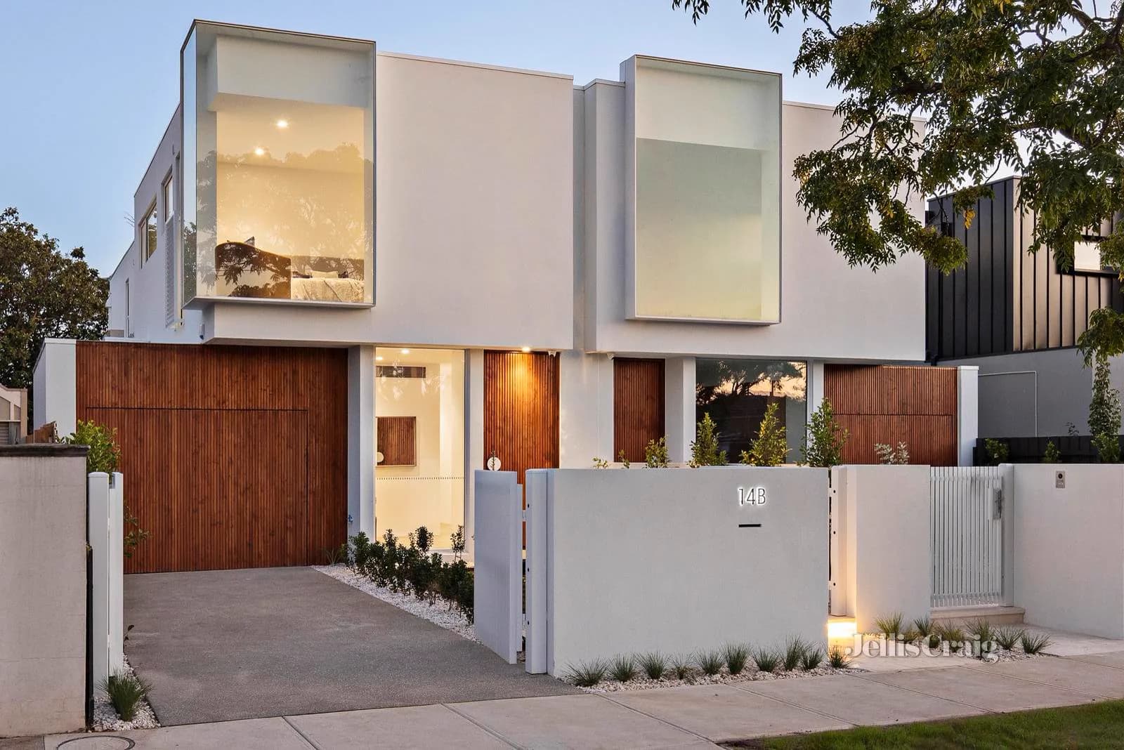 White and timber facade of 14B Brooks Street