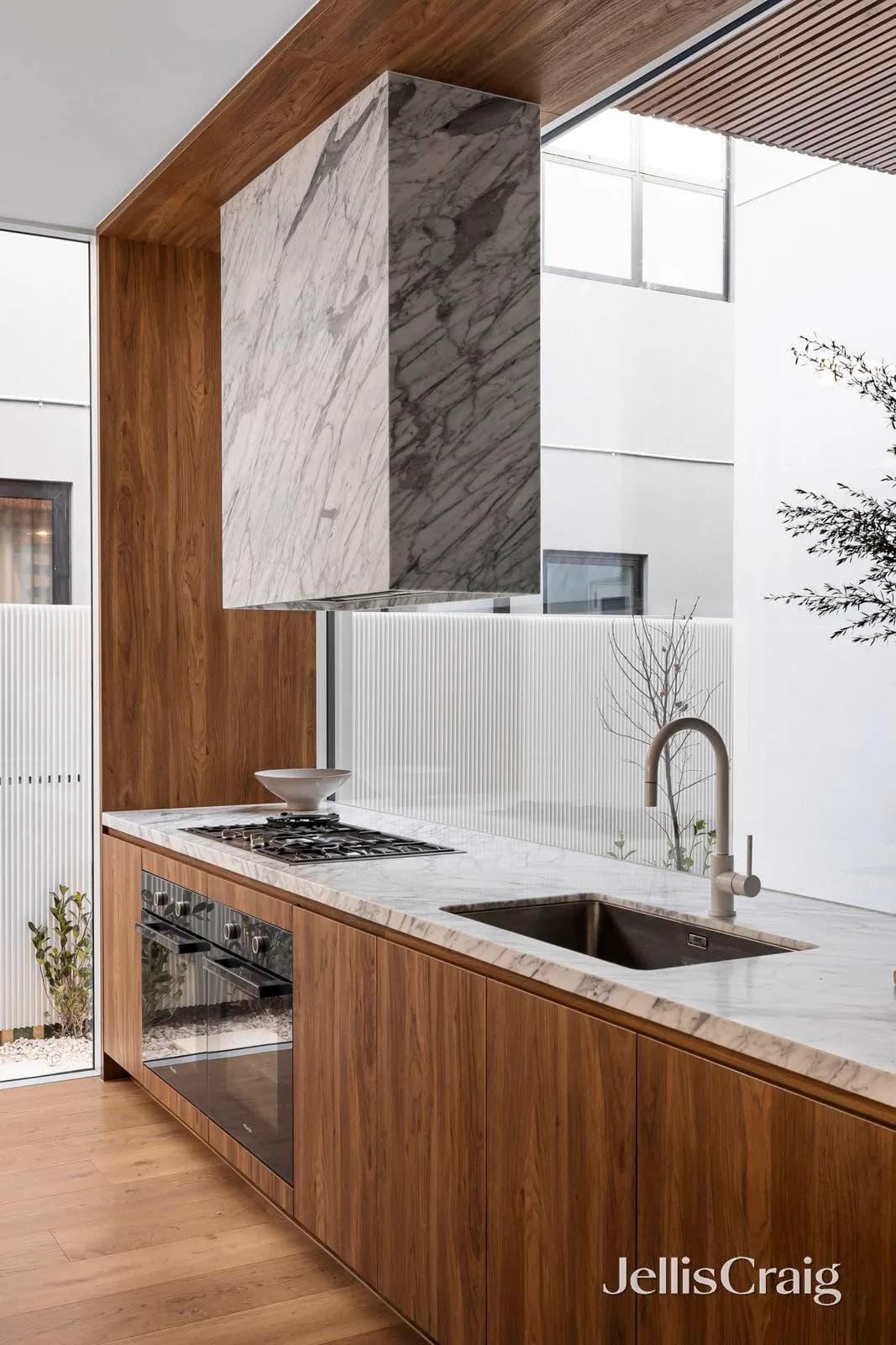 Timber and marble kitchen at 14A Brooks Street
